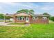 Charming single story brick home with a covered carport and well maintained lawn at 1690 Montevista Dr, Shelby, NC 28150