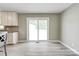Bright kitchen nook has slider doors to the back deck and updated cabinetry at 1690 Montevista Dr, Shelby, NC 28150