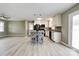 Modern eat-in kitchen features stainless appliances, decorative tile backsplash, and updated counters at 1690 Montevista Dr, Shelby, NC 28150