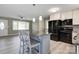 Modern kitchen with eat-in island, stainless appliances, and natural light at 1690 Montevista Dr, Shelby, NC 28150