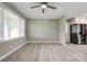 Bright living room with new wood-look floors and modern light fixtures at 1690 Montevista Dr, Shelby, NC 28150