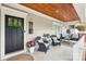 Cozy front porch with comfortable seating, a welcome mat and a charming spot to relax and enjoy the outdoors at 1701 Dearmon Dr, Charlotte, NC 28205
