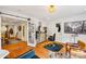 Salon room with a styling station, hardwood floors, and white walls at 1701 Dearmon Dr, Charlotte, NC 28205