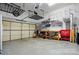 Organized garage featuring overhead storage racks, shelving, and a workbench to maximize space and functionality at 17130 Bridgeton Ln, Huntersville, NC 28078