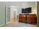 Open floor plan with beautiful hardwood floors and an elegant desk at 17130 Bridgeton Ln, Huntersville, NC 28078