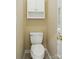 A conveniently located powder room, with a white toilet and neutral colored walls at 17130 Bridgeton Ln, Huntersville, NC 28078