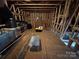 Spacious unfinished attic for storage or customizable space at 19031 Brandon James Dr, Cornelius, NC 28031