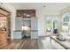 Bright office space features custom built-ins and direct access to the backyard at 19031 Brandon James Dr, Cornelius, NC 28031