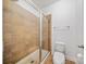 Modern bathroom with tiled shower, glass enclosure, and sleek fixtures, offering a spa-like experience at 204 Aztec Cir, Mooresville, NC 28117