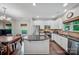 Kitchen boasts stainless appliances, granite counters, and a center island at 204 Aztec Cir, Mooresville, NC 28117