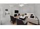 Living room with neutral tones, comfortable seating, and natural light at 204 Aztec Cir, Mooresville, NC 28117