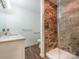 Modern bathroom featuring a glass-enclosed shower with unique tiling and a sleek vanity at 2222 Hearthstone Dr, Gastonia, NC 28056