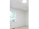 Bright bedroom featuring a window, carpet flooring, and minimalist decor with ample space at 2222 Hearthstone Dr, Gastonia, NC 28056