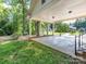 Spacious carport featuring brick supports with a view of the front yard at 2222 Hearthstone Dr, Gastonia, NC 28056