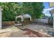 Backyard featuring a white gazebo with a built in grill at 2432 Barkers Ridge Dr, Bessemer City, NC 28016