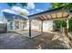 Backyard featuring a covered area with a white storage shed at 2432 Barkers Ridge Dr, Bessemer City, NC 28016