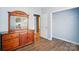 Bedroom with wood floors, light blue walls, and a closet at 2432 Barkers Ridge Dr, Bessemer City, NC 28016