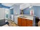 Well-lit kitchen with light countertops, wood cabinets, and modern appliances at 2432 Barkers Ridge Dr, Bessemer City, NC 28016