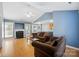 Cozy living room with vaulted ceilings, fireplace, wood floors, and comfortable seating at 2432 Barkers Ridge Dr, Bessemer City, NC 28016