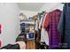 Walk-in closet features shelves, drawers, and plenty of hanging storage at 2432 Barkers Ridge Dr, Bessemer City, NC 28016