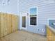 Back deck featuring a privacy fence and an exterior door leading into the property at 2535 Ruby Dixon Crossing Dr # 19, Gastonia, NC 28056
