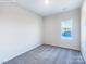 Cozy carpeted bedroom with a bright window and a neutral color palette at 2535 Ruby Dixon Crossing Dr # 19, Gastonia, NC 28056