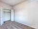 Bedroom with a walk-in closet featuring shelving and open door at 2535 Ruby Dixon Crossing Dr # 19, Gastonia, NC 28056