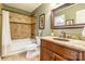 Charming bathroom featuring a custom vanity, updated fixtures, and a shower with tile surround at 2730 Tiffany Dr, Rock Hill, SC 29732