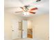 Bedroom featuring a ceiling fan, two doors, and access to the staircase at 2730 Tiffany Dr, Rock Hill, SC 29732