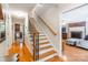 Inviting foyer with hardwood floors, staircase with iron spindles, and views into the living spaces at 2730 Tiffany Dr, Rock Hill, SC 29732