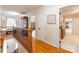 Upstairs hallway featuring hardwood floors, decorative railing, and great natural light at 2730 Tiffany Dr, Rock Hill, SC 29732
