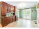 Eat-in kitchen featuring custom cabinetry and a French door leading to the outdoor deck at 2730 Tiffany Dr, Rock Hill, SC 29732