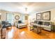 Comfortable living room with hardwood floors, neutral decor, and plenty of seating options at 2730 Tiffany Dr, Rock Hill, SC 29732