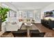 Comfortable living room with stylish decor, neutral colors, and lots of natural light at 3009 Loso Ter # 58, Charlotte, NC 28217