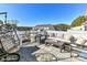 Relaxing rooftop deck with outdoor seating, lounge chairs and beautiful views of the neighborhood at 3009 Loso Ter # 58, Charlotte, NC 28217