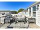 Rooftop patio with outdoor seating featuring views of the neighborhood on a sunny day at 3009 Loso Ter # 58, Charlotte, NC 28217