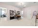 Spacious flex space featuring neutral walls, open floor plan, and natural light, perfect for entertaining and hobbies at 3018 Tramore Dr, Harrisburg, NC 28075