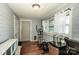 Exercise room with wood floors, a window, and exercise equipment at 310 Patterson Ave, Mooresville, NC 28115