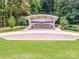 Exterior view of a community pavilion featuring stone accents and manicured landscaping at 310 Patterson Ave, Mooresville, NC 28115