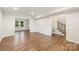 Spacious basement featuring wood-look floors and neutral paint, perfect for entertaining and relaxing at 3101 Willowbrae Rd, Charlotte, NC 28226