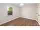 Inviting bedroom showcasing hard surface floors and a window with natural light at 3101 Willowbrae Rd, Charlotte, NC 28226
