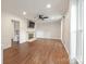 Bright living room with a fireplace, wood-look floors, and large windows with great natural light at 3101 Willowbrae Rd, Charlotte, NC 28226