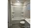 Bathroom featuring a shower and bathtub combination with white tile surround at 345 Hyssop Ct, Fort Mill, SC 29715
