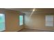 This bedroom with large windows provide ample natural light and views of the outside at 345 Hyssop Ct, Fort Mill, SC 29715