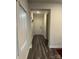Hallway with dark wood floors leading to the front door at 345 Hyssop Ct, Fort Mill, SC 29715