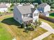 Aerial view of a two-story home with a well-maintained lawn and mature landscaping at 417 Homestead Ln, Albemarle, NC 28001