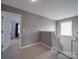 Hallway showcases a bedroom view, soft carpet, and neutral gray walls at 417 Homestead Ln, Albemarle, NC 28001