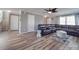 Comfortable living area with a plush leather sofa, hardwood flooring, and ample space for relaxing at 417 Homestead Ln, Albemarle, NC 28001