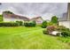 Sprawling backyard with lush landscaping and grass at 422 Garnet Ct, Fort Mill, SC 29708