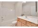 Functional bathroom with a tub, shower, vanity, and neutral color scheme at 422 Garnet Ct, Fort Mill, SC 29708